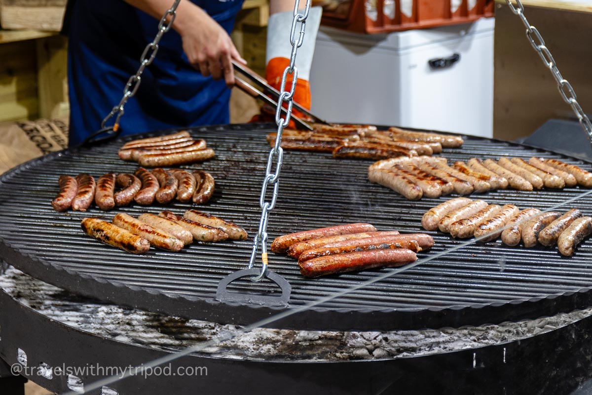 Sausages on grill at Christmas market
